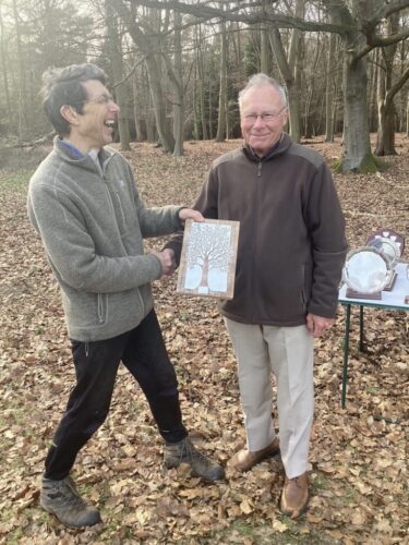 John receiving trophy from Chairman, Peter Woods