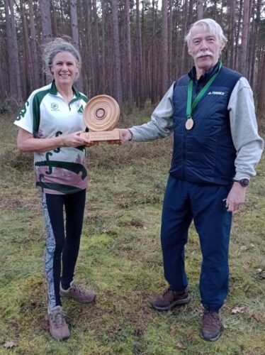Eddie presenting Lyn with Club Championship Trophy