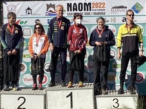 Lyn West on podium at NAOM